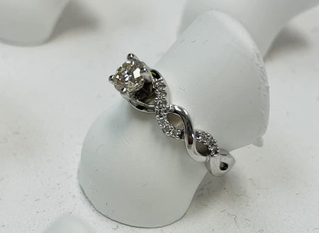 0.63 Carat Twisting Infinity Gold and Diamond Split Shank Pave Set Diamond Engagement Ring with a 0.5 Carat J-K I2 Center