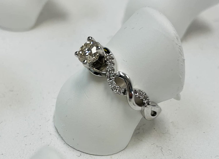 0.63 Carat Twisting Infinity Gold and Diamond Split Shank Pave Set Diamond Engagement Ring with a 0.5 Carat J-K I2 Center