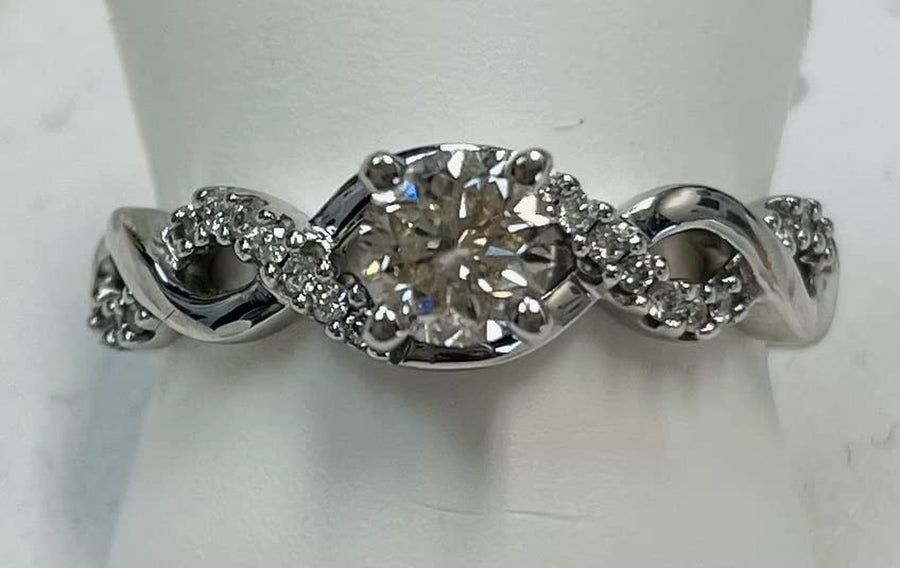 0.63 Carat Twisting Infinity Gold and Diamond Split Shank Pave Set Diamond Engagement Ring with a 0.5 Carat J-K I2 Center